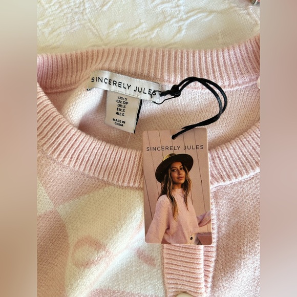 Sincerely Jules Baby Pink and White Knit Bow Cardigan
Size: Small
NWT - Picture 14 of 15